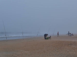 Angler am frühen Morgen am Playa del Calé.